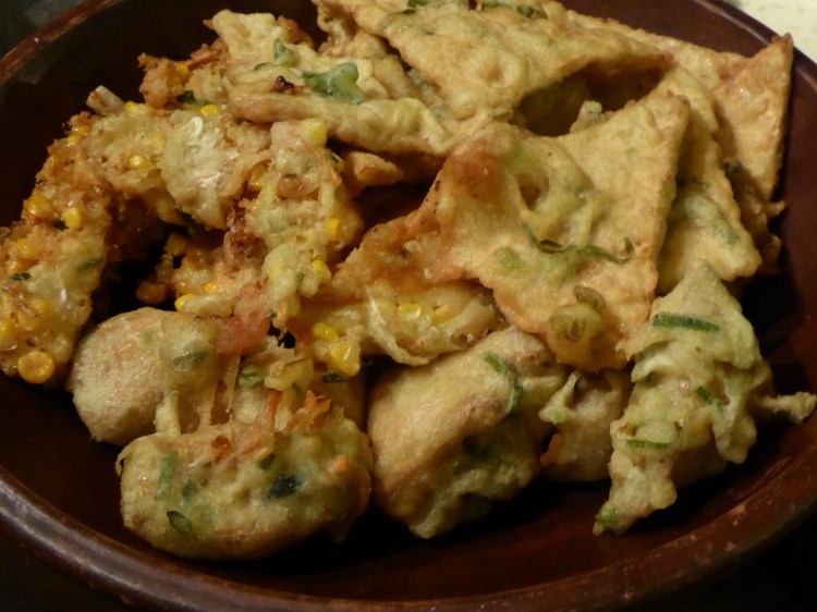 Corn fritters, tofu parcels with chicken and tempeh parcels with vegetables. 